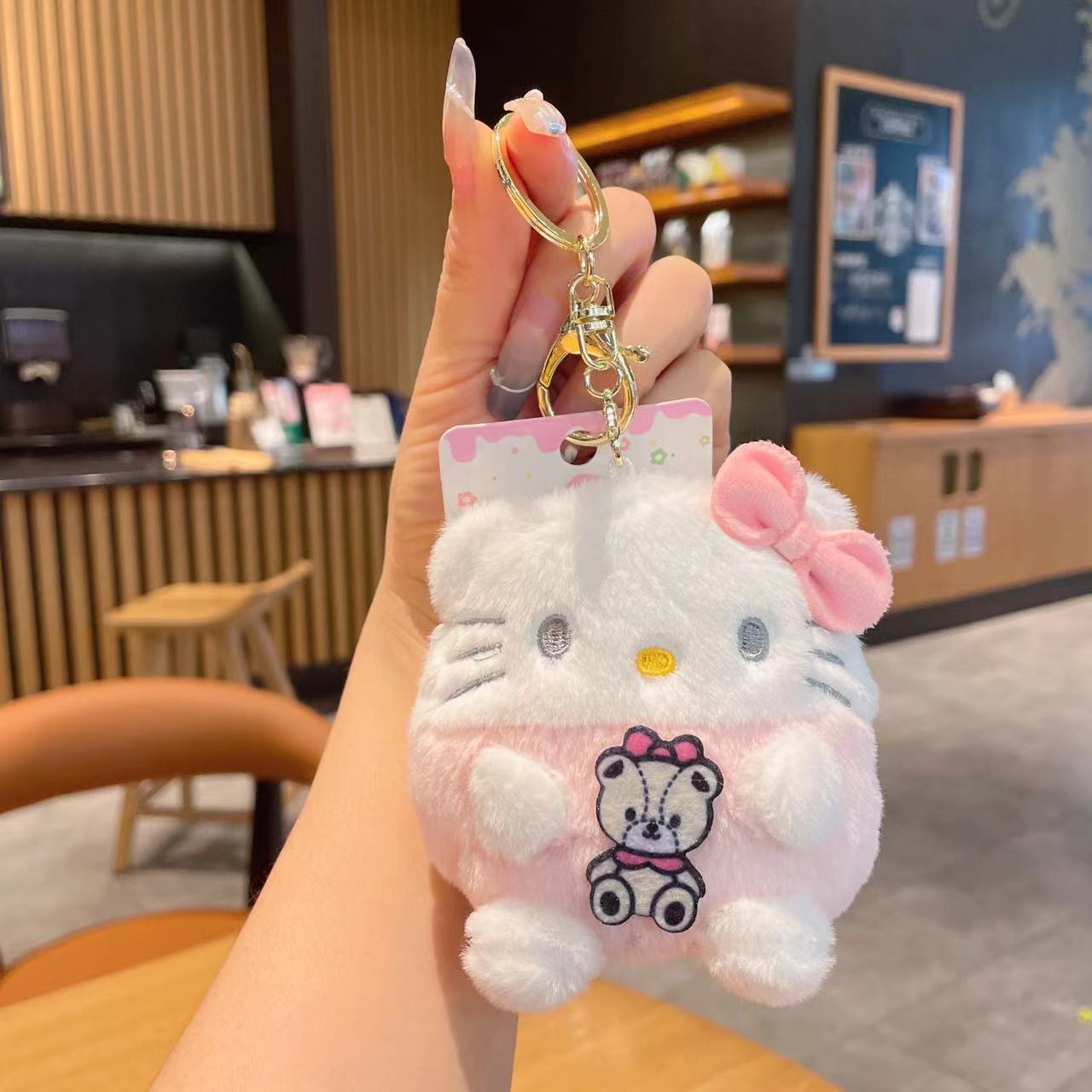 Gantungan Kunci Dompet Bulu Boneka Sanrio Karakter Kitty Kuromi Melody Stella Ball Lucu