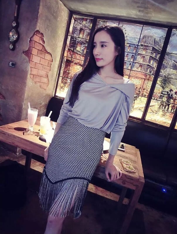 Long Sleeved V Neck T-Shirt and Fringed Irregular Skirt