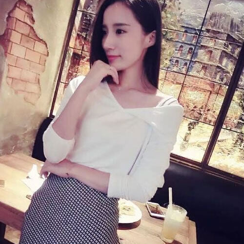 Long Sleeved V Neck T-Shirt and Fringed Irregular Skirt