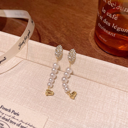 Earring Huggie Niche High End Pearl XEA1941