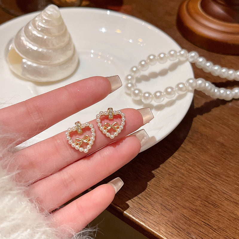 Earring Stud Love Heart Pearl Sweet Hollow Bow XEE5778